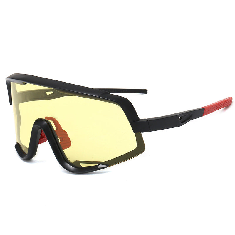 Gafas de sol deportivas shield negro/amarillo — lente panorámica espejada para ciclismo | Cientosiete