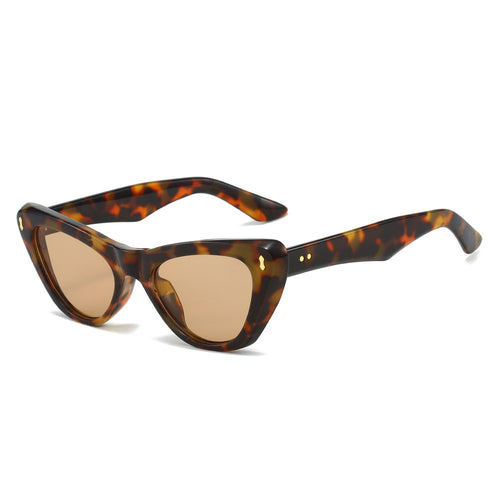 Gafas de sol cat-eye chunky en color leopardo y champán — montura acetato con remaches dorados | Cientosiete