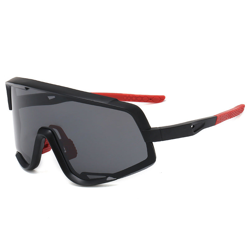 Gafas de sol deportivas shield negro-rojo/gris — lente panorámica espejada para ciclismo | Cientosiete